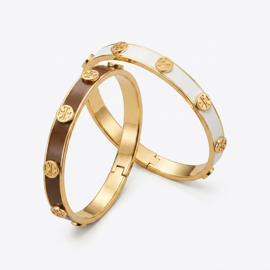 Tory Burch Gold and White Bangle Bracelet featuring 18k gold-plated brass and ivory enamel