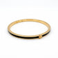 Tory Burch Icon Thin Enamel Bracelet in gold-tone with black enamel inlay and iconic Double T logo
