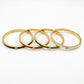 Tory Burch Icon Thin Enamel Bracelet in gold-tone with black enamel inlay and iconic Double T logo