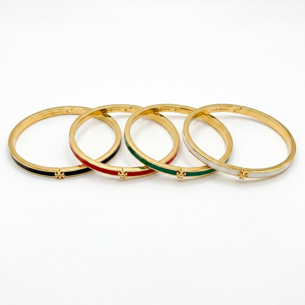 Tory Burch Icon Thin Enamel Bracelet in gold-tone with black enamel inlay and iconic Double T logo