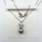 Tory Burch Kira Pearl Pendant Necklace in silver-tone featuring a Chevron-patterned Double T logo
