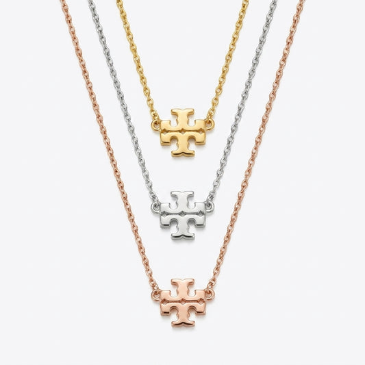 Tory Burch Kira Gold Pendant Necklace in 18k gold-plated brass with Chevron pattern