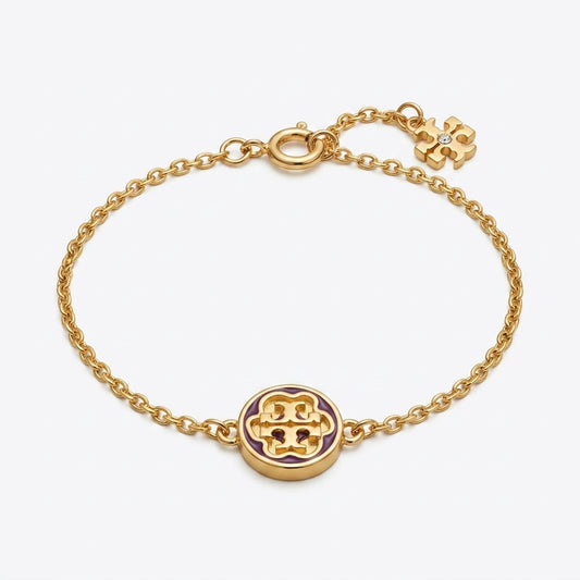 Tory Burch Kira Flower Gold Pendant Bracelet featuring mother of pearl petals and Double T logo