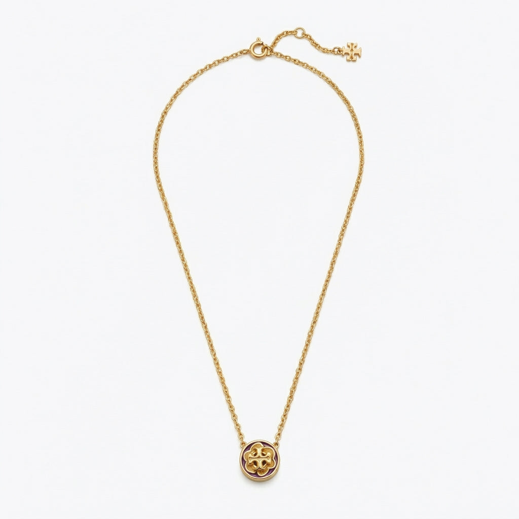 Tory Burch Kira Flower Pendant Necklace in 18k gold-plated brass with Mother of Pearl and Chevron logo