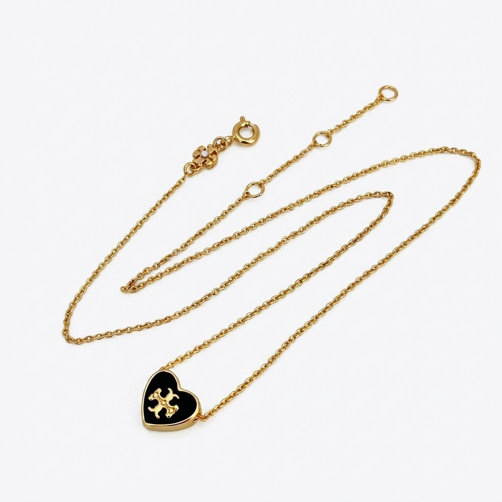 Tory Burch Kira Heart Pendant Necklace in 18k gold-plated brass featuring Double T logo