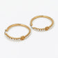 Tory Burch Logo Pearl Hoop Earrings featuring a Double T icon and lustrous pearl drop in 18k gold finish
