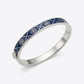 Tory Burch Miller Enamel Logo Hinge Bracelet in silver-tone with vibrant enamel inlay and cutout Double T