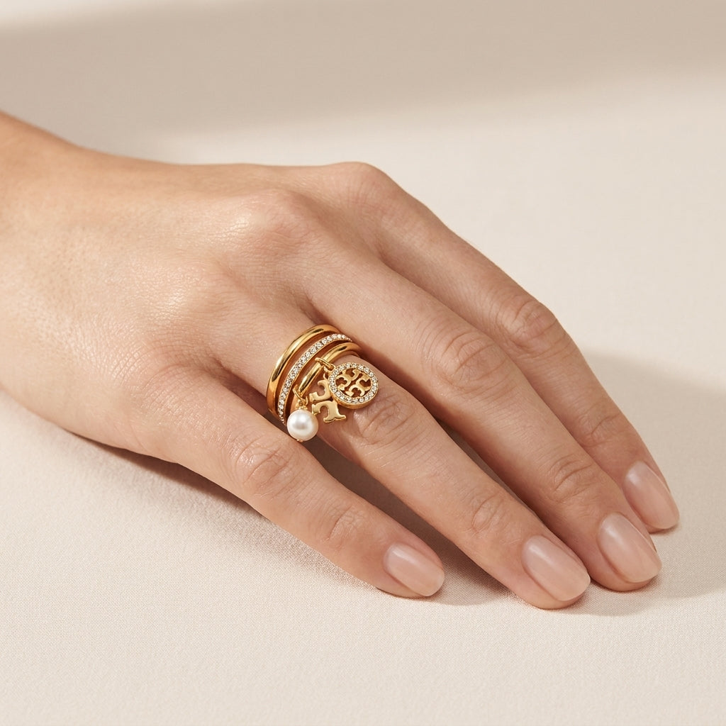 Hand-worn view of Tory Burch Miller Pave Ring to show the actual width and finger coverage