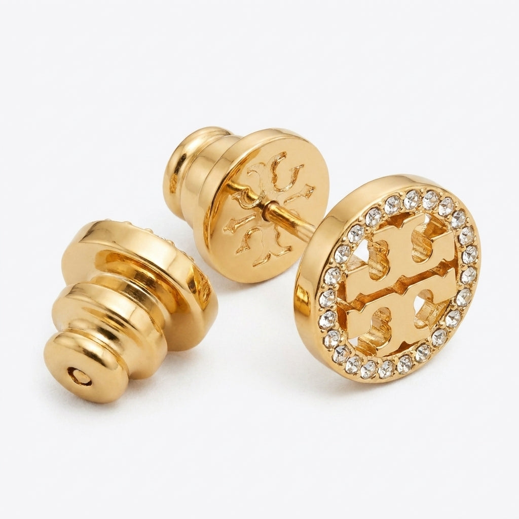 Macro shot of the precision-set crystals and laser-cut Double T logo on Miller Studs