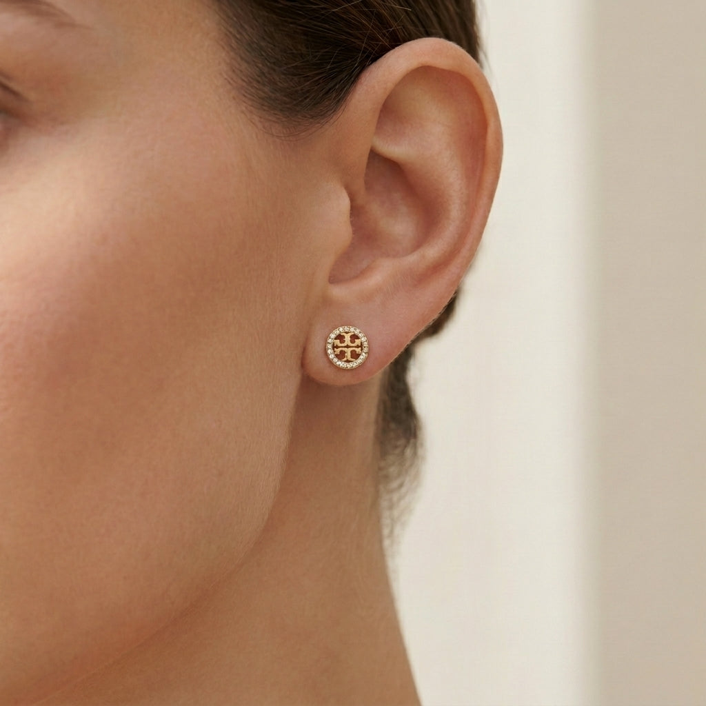 Model wearing Tory Burch Miller Pave Studs for a glamorous and effortless luxury style