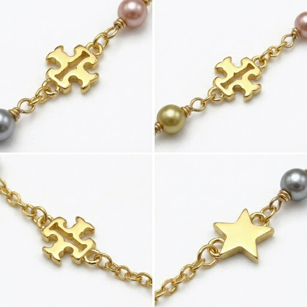 Detailed shot of the lobster clasp and the signature Double T logo tag on the pearl bracelet