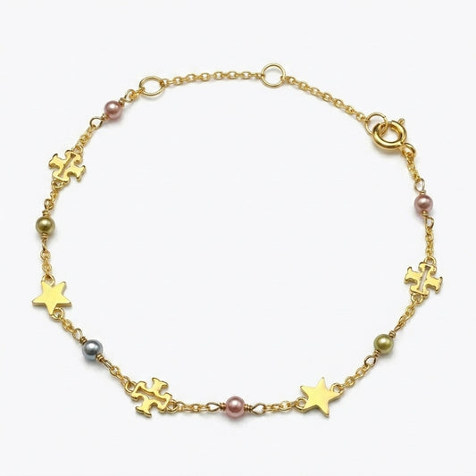 Tory Burch Moondance Pearl Bracelet featuring a delicate gold chain and high-luster pearls