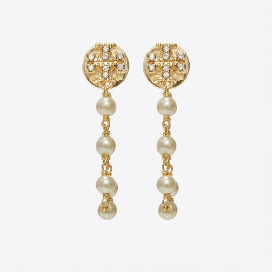 Tory Burch Moondance Pearl and Chain Earrings in gold-tone finish with a signature Double-T logo and drop pearl.