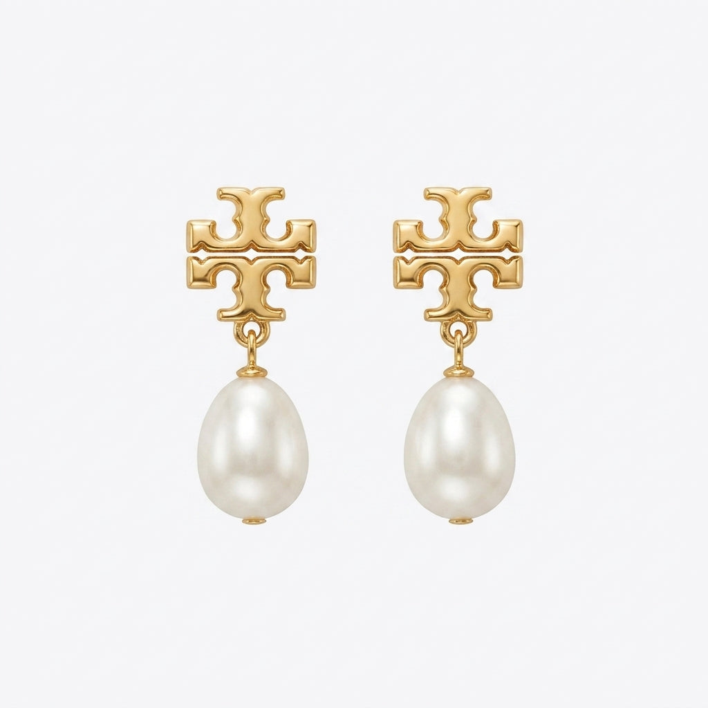 Tory Burch Moondance Pearl Drop Earrings with celestial moon motifs and Double T logo in gold