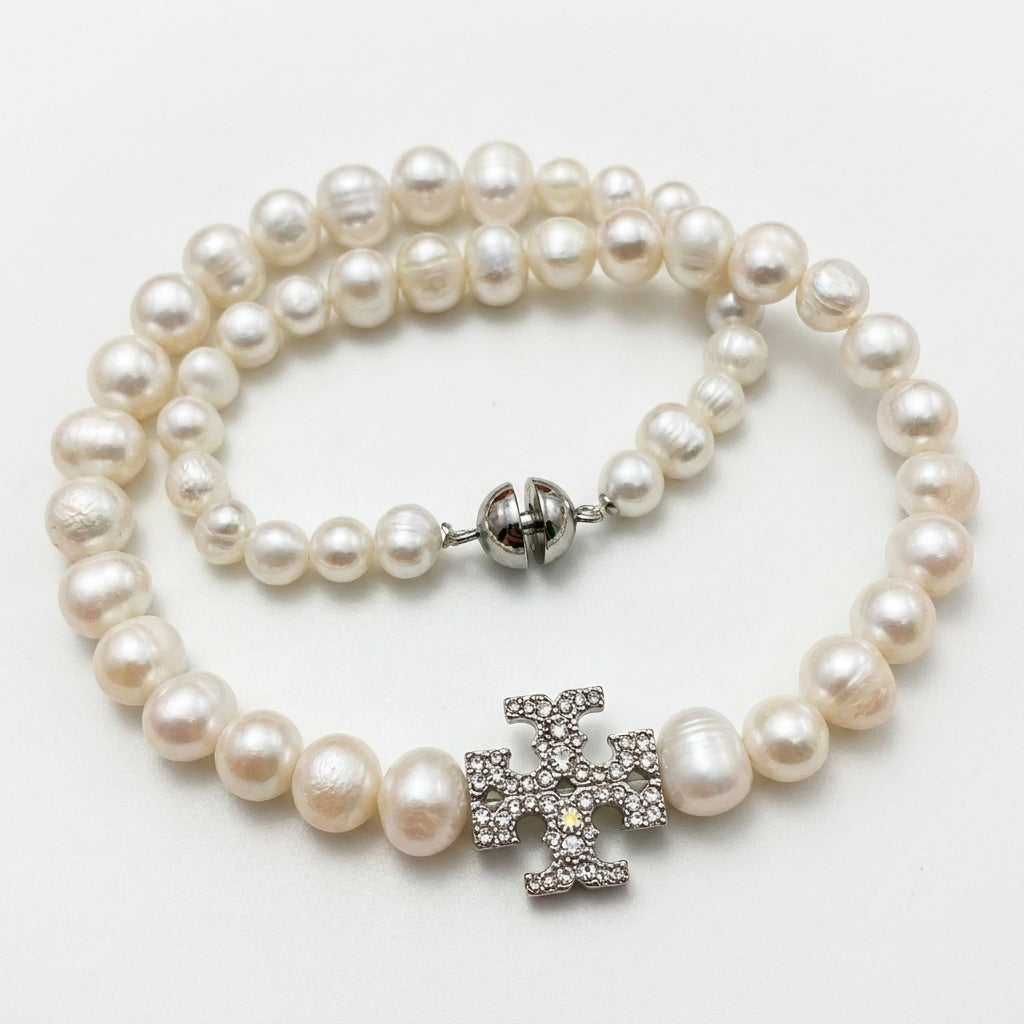 Tory Burch Moondance Pearl Necklace in gold-tone with high-luster celestial pearls