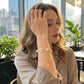 Chic lifestyle styling of Tory Burch Pearl Chain Bracelet, a timeless accessory for any occasion