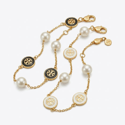 Tory Burch Pearl Chain Bracelet in gold-tone finish with high-luster cream pearls
