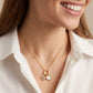 Model wearing Tory Burch Mother of Pearl Charm Necklace, an elegant feminine layering piece