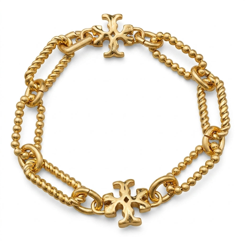 Tory Burch Roxanne Chain Bracelet in polished gold-tone featuring bold sculptural links and Double T logo