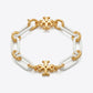 Tory Burch Roxanne Short Chain Bracelet in gold-tone finish with sculptural links and Double T logo