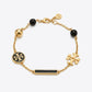 Tory Burch TB Logo and Pearl Bracelet in gold-tone featuring polished Double T and cream pearls