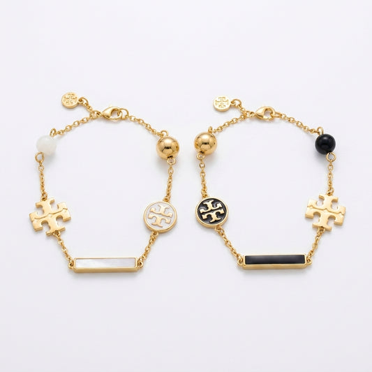Tory Burch TB Logo and Pearl Bracelet in gold-tone featuring polished Double T and cream pearls