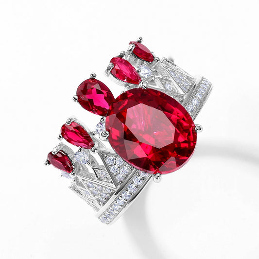 Luxury vintage crown style ruby ring for women, sterling silver setting with large oval red ruby.