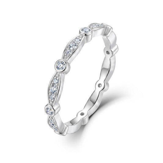 Vintage milgrain and bezel set lab grown diamond stacking ring in sterling silver isolated on white background