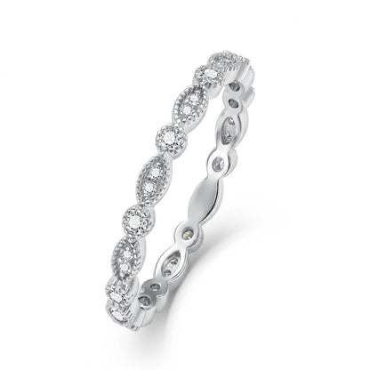 Vintage milgrain marquise and round lab grown diamond stacking ring in sterling silver isolated on white background