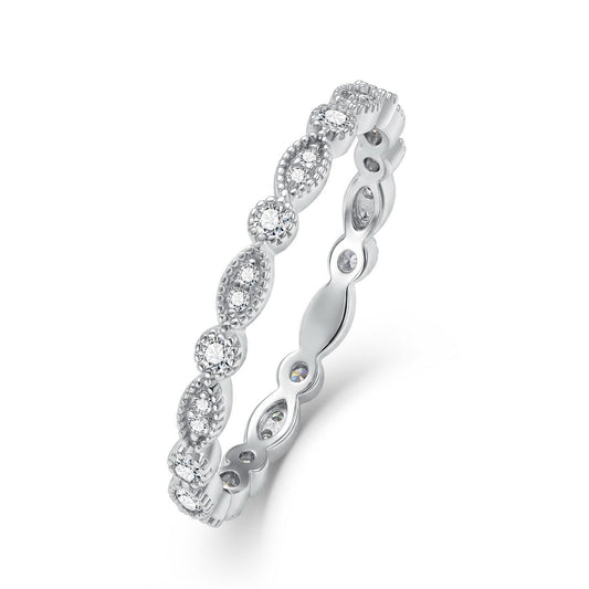 Vintage milgrain marquise and round lab grown diamond stacking ring in sterling silver isolated on white background