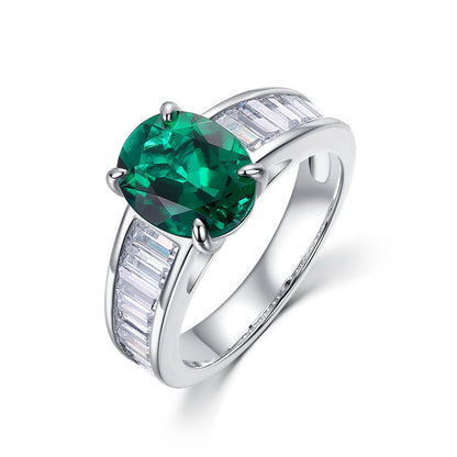 Vintage lab-grown classic oval-cut emerald ring for women with baguette side diamonds in 925 silver.