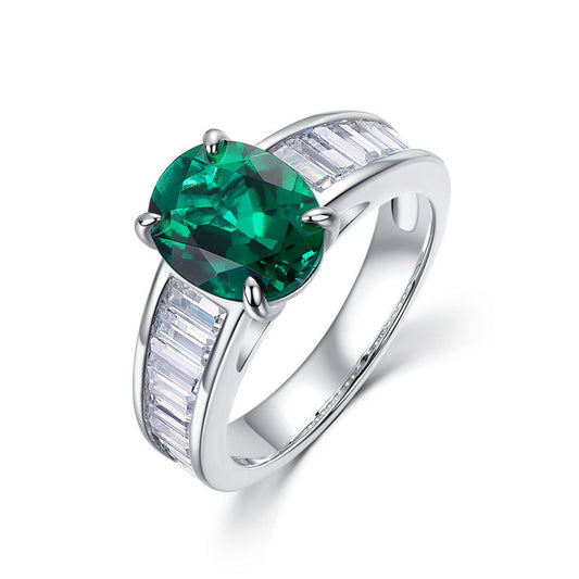 Vintage lab-grown classic oval-cut emerald ring for women with baguette side diamonds in 925 silver.